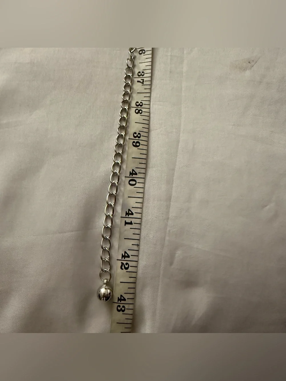 Silver tone metallic disc chain belt